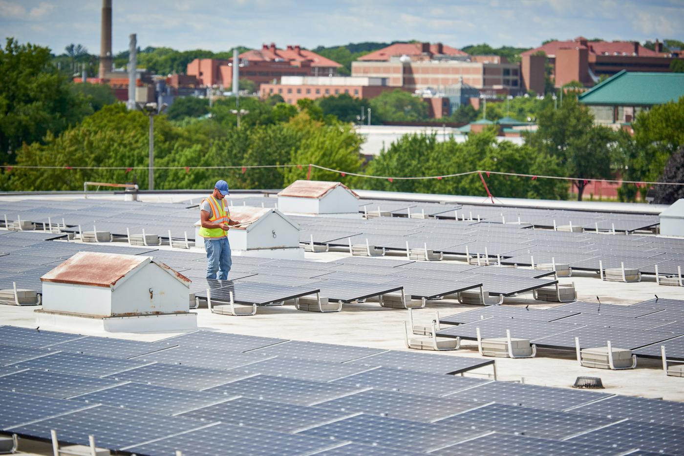 Minnesota solar installer on roof MnSEIA and Blue Horizon Energy