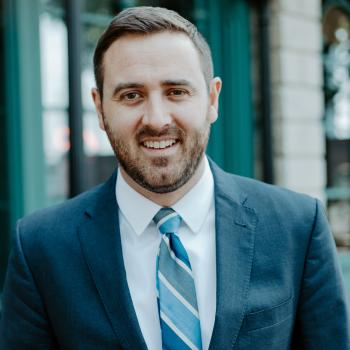 Headshot of Logan O'Grady, MnSEIA Board of Directors Member