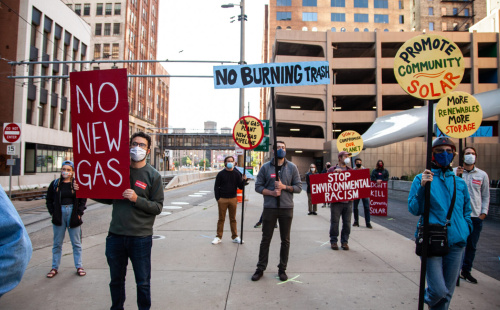 Demonstrators protest Xcel Energy in Minnesota.