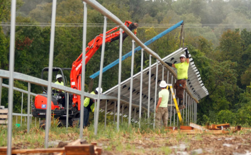 Midwest Energy News, MnSEIA solar installers on community solar garden job site