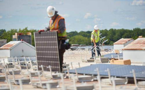 Solar Installers work on roof - MnSEIA, Blue Horizon Energy