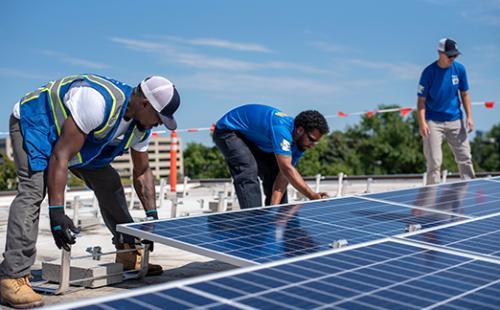 Solar Installers on roof in Minnesota, MnSEIA