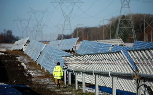 Worker at a utility scale solar project in Minnesota, MnSEIA