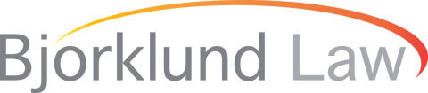 MnSEIA member Bjorklund Law logo, gray lettering with orange semi-circle