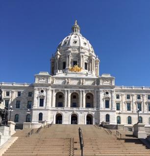 MN State Capitol Building with blue sky and steps in front
